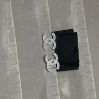 orecchini cc colore argento in moda