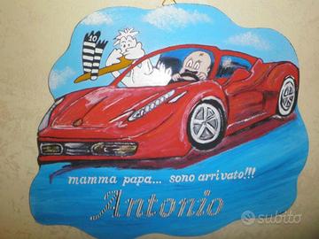 Cicogne e pannelli per annuncio nascita