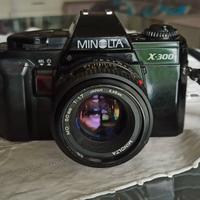 Macchina fotografica Minolta X300s 35 mm.