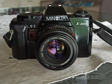 Macchina fotografica Minolta X300s 35 mm.