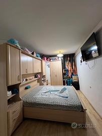 Camera da letto doppio con tv 55