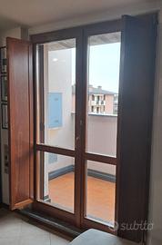 Ante oscuranti in legno per infisso porta finestra