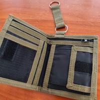 portafoglio zip verde e nero