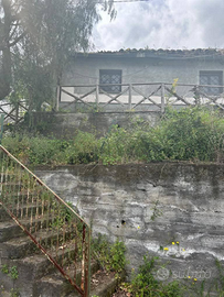 Casetta panoramica con terreno a Milo