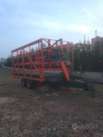 Carrellone carica balle automatico