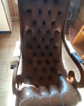 sedia a dondolo in legno e pelle