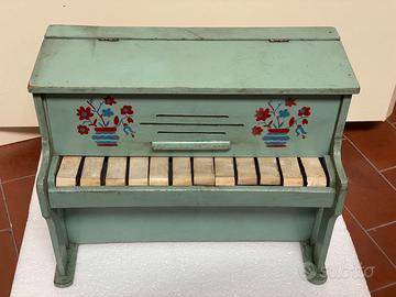 Pianoforte gioco musicale in legno vintage