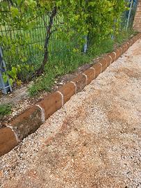 cordolo in tufo romano etrusco marrome