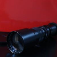 Obiettivo fotografico con adattatore canon