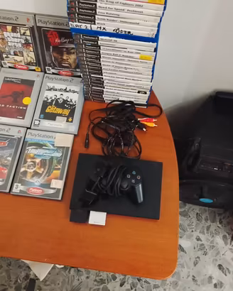 PS2 slim+ 54 giochi e Platinum e controller e cavi