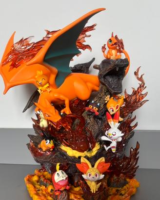 statua pokemon charizard e starter di tipo fuoco