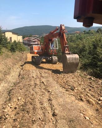 Escavatore PMI 