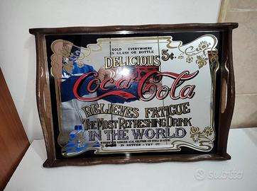 Coca Cola

Vassoio Specchio

Bordo in legno
