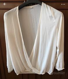 Blusa con manica lunga