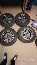 4 Cerchi in lega PSW 6,5J x 16" e gomme