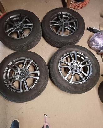 4 Cerchi in lega PSW 6,5J x 16" e gomme