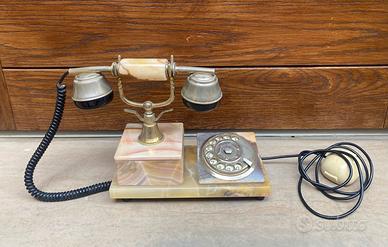 Telefono antico in marmo a disco rotante vintage