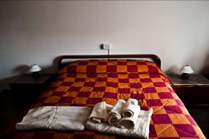 Camera con bagno privato in appartamento condiviso