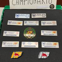 Stemma e targhette Lancia Delta