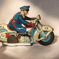 motocicletta polizia in latta giappponese a frizi.