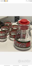set coca cola 6 bicchieri  più caraffa  porta ghia