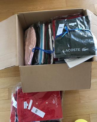 Stock polo Lacoste bambino/uomo/donna