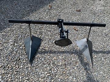 Asolcatore doppio registrabile per motocoltivatore