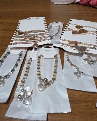 17 bracciali in acciaio  gold e silver