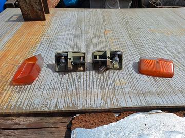 Fari anteriori e fanali posteriori Apecar d'epoca