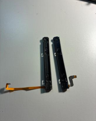 Nintendo switch Oled guida scorrimento joycon