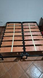 Due reti singole a doghe larghe e due materassi