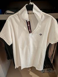 polo bianca del marchio Sir Raymond Tailor. 