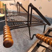 griglia basculante per camino