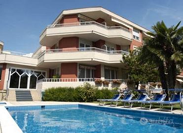 Moderno quadrilocale vuoto con box