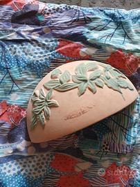 Appliqué da esterno in terra cotta