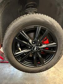 4 cerchi Momo Reds da 16 con gomme da neve