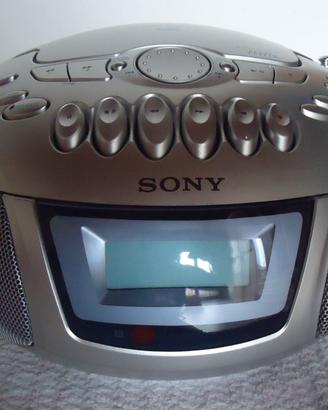 Lettore CD radiosveglia + cd + mangianastri  SONY