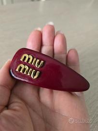 Fermacapelli miu miu 