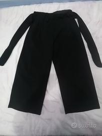 giubbotto, camicia e pantaloni eleganti