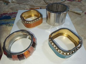 4 bracciali rigidi donna