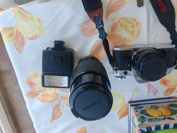 Canon AE1 PROGRAM + 70-210 f/4+flash 177A. 