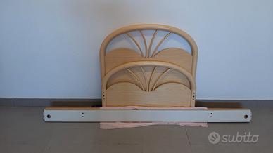 Letto singolo completo di rete.