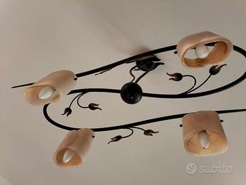 rete e materasso , lampadario e applique