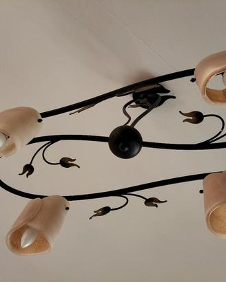 rete e materasso , lampadario e applique