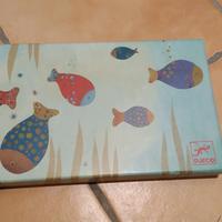 Gioco di pesciolini con calamite da pescare