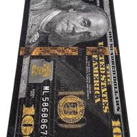 Tappeto nero con banconota da 100 dollari, tappeto