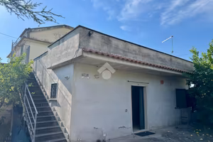 PORZIONE DI BIFAMILIARE A SONNINO