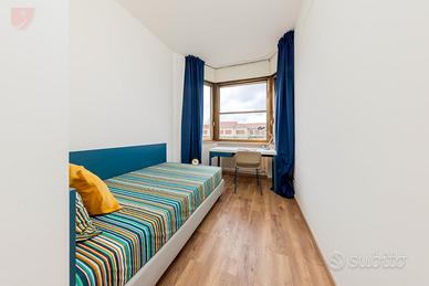 Singola luminosa con balcone [FE_CVR136-A_S5]