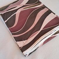 Tessuto elasticizzato con fantasia a onde 