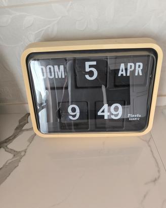 orologio a palette  anni 80 misura 41x13x31 e il 